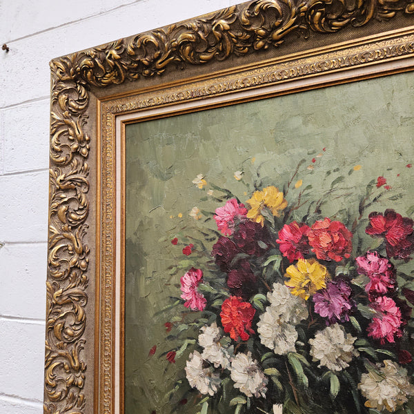 Stunning signed oil on canvas floral still life in a superb gilt frame. Sourced directly from France and in good original condition