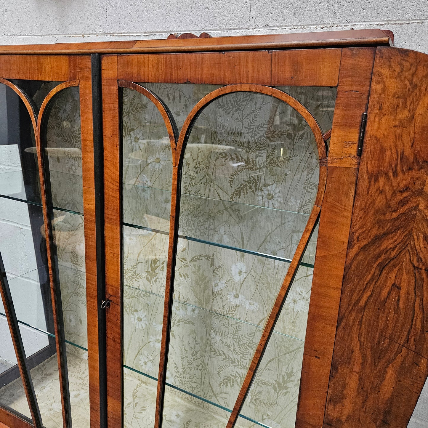 Stunning Art Deco display cabinet with two glass shelfs, Walnut and lockable glass doors. This cabinet is in great original condition for the age.