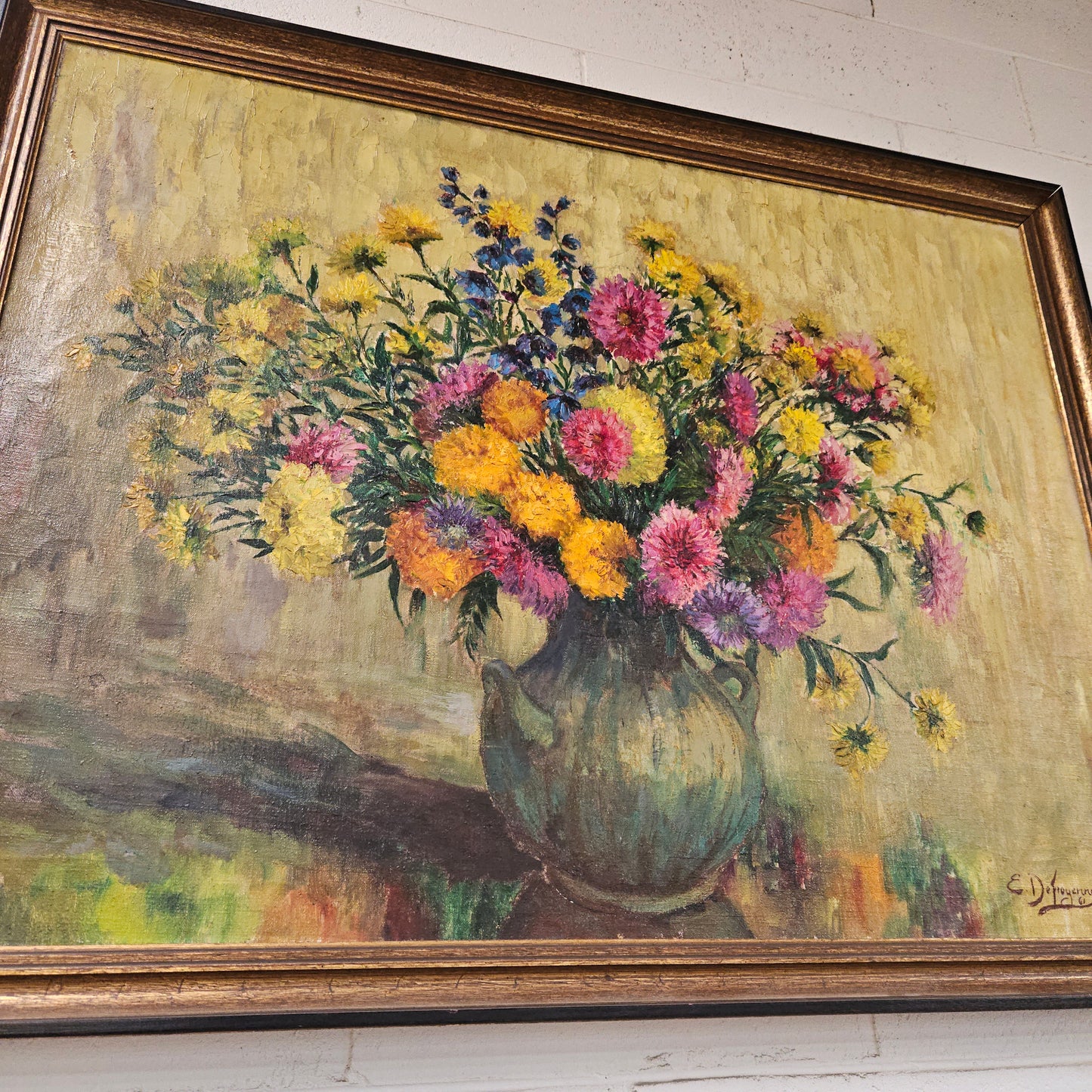 Sourced from France a large signed oil on canvas still life in a simple but elegant gilt frame. It is in good original condition. Please see photos as they form part of the description and condition.