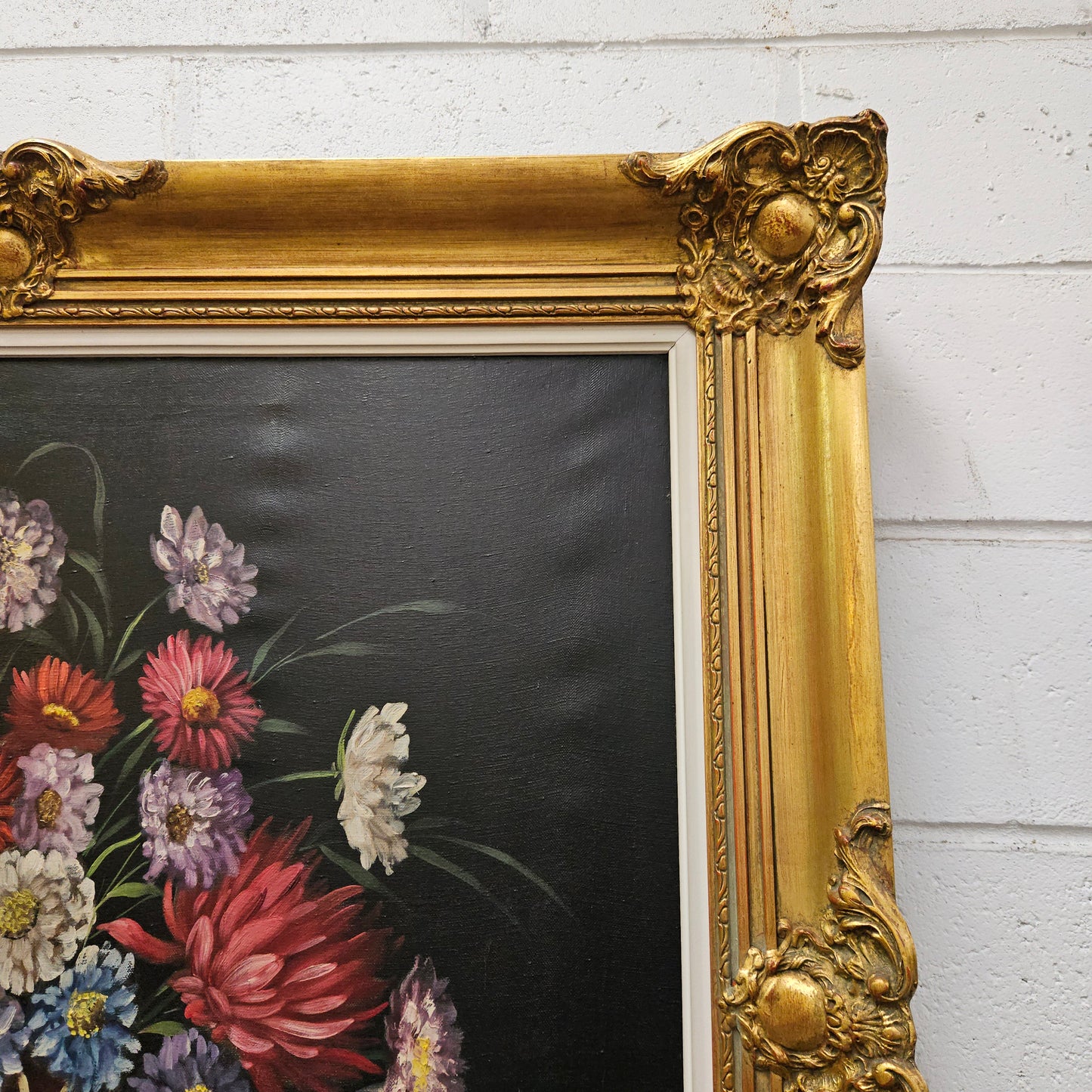 Sourced from France a vibrant signed oil on canvas floral still life in a stunning gilt frame. In good original detailed condition. Please see photos as they form part of the description and condition.