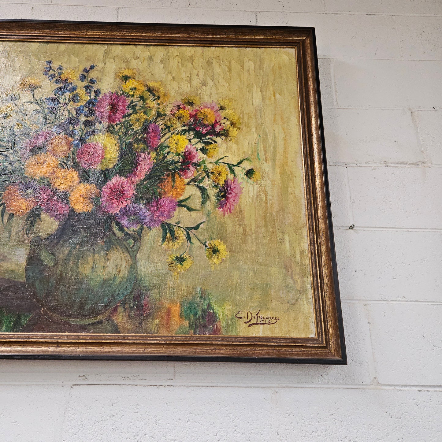 Sourced from France a large signed oil on canvas still life in a simple but elegant gilt frame. It is in good original condition. Please see photos as they form part of the description and condition.