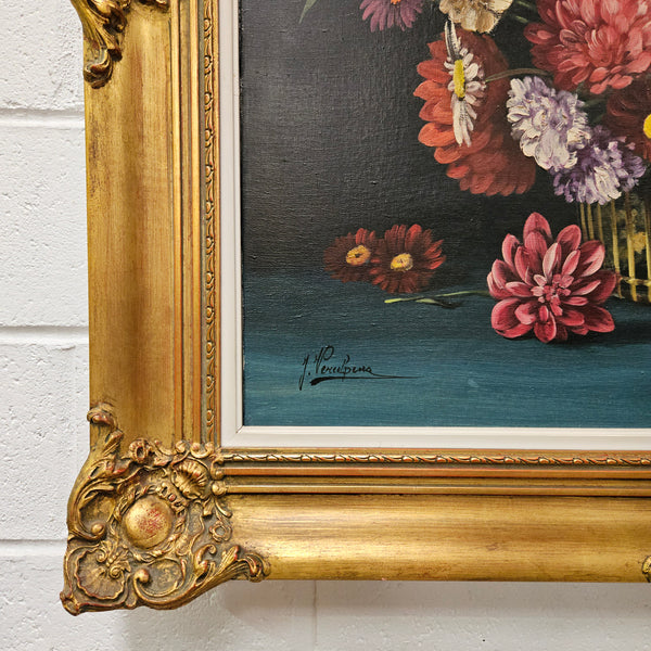 Sourced from France a vibrant signed oil on canvas floral still life in a stunning gilt frame. In good original detailed condition. Please see photos as they form part of the description and condition.