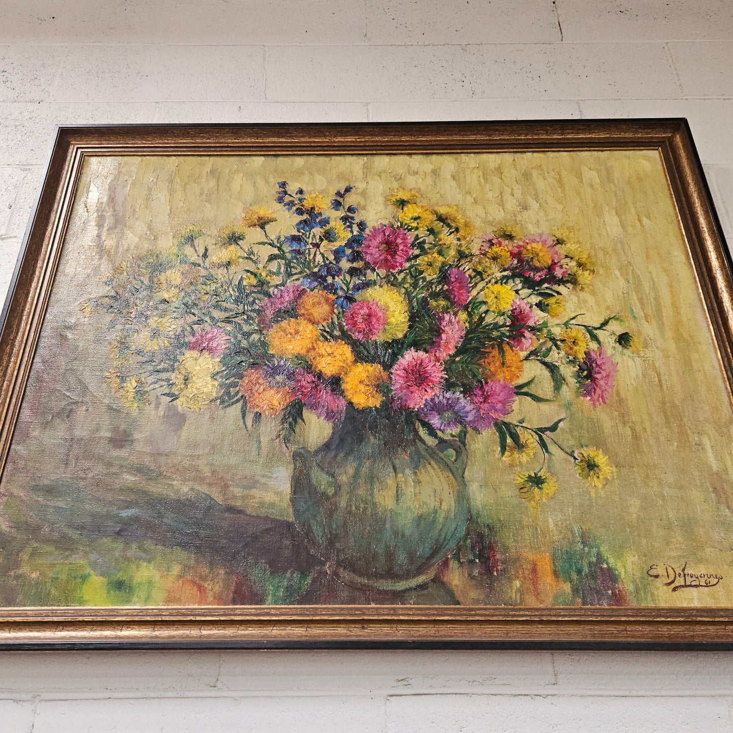 Sourced from France a large signed oil on canvas still life in a simple but elegant gilt frame. It is in good original condition. Please see photos as they form part of the description and condition.