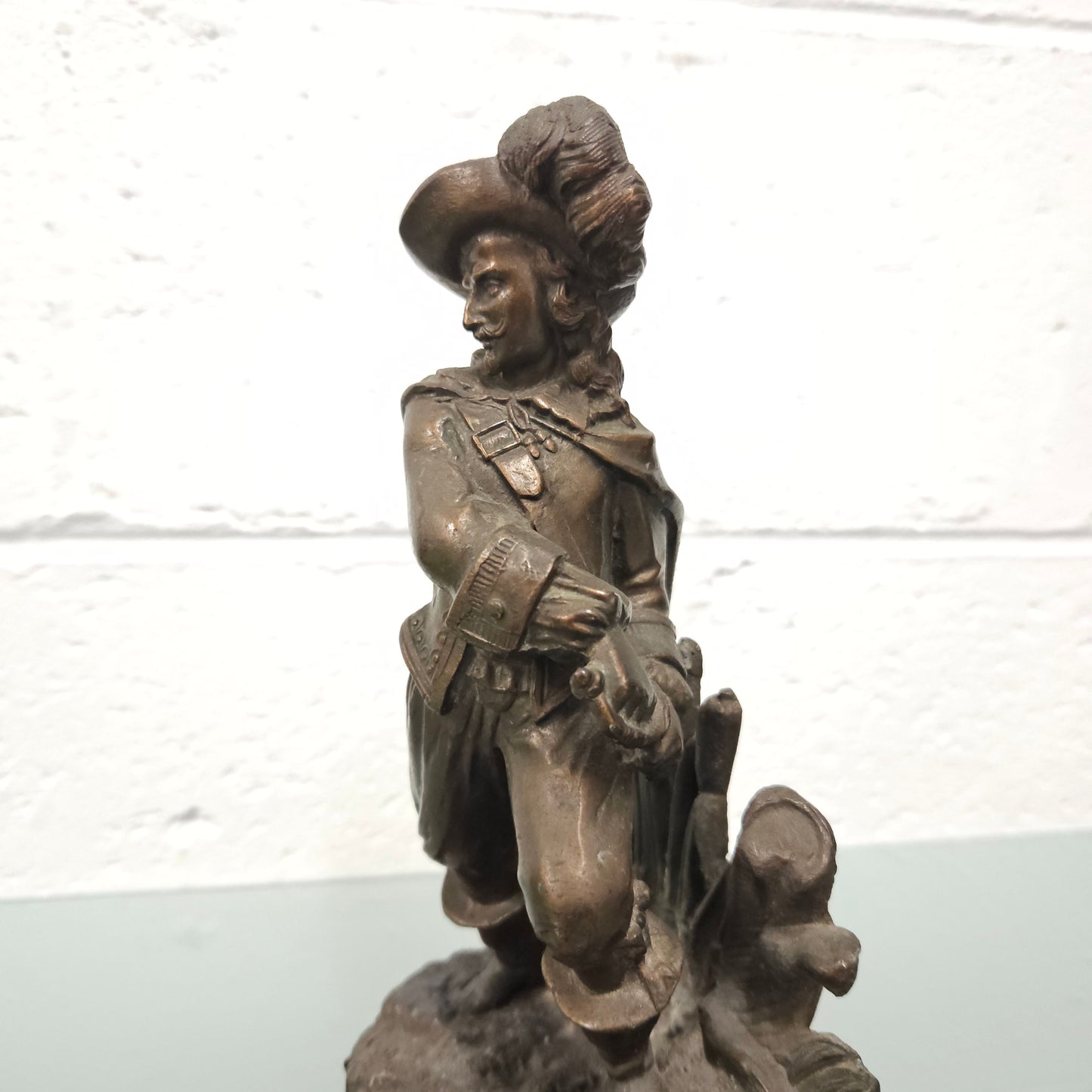 Antique bronzed spelter musketeer figure, in good original condition.