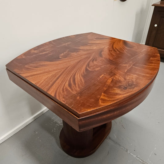 French Art Deco flame mahogany center table. Sourced directly from France it is in good original detailed condition. Circa 1930's