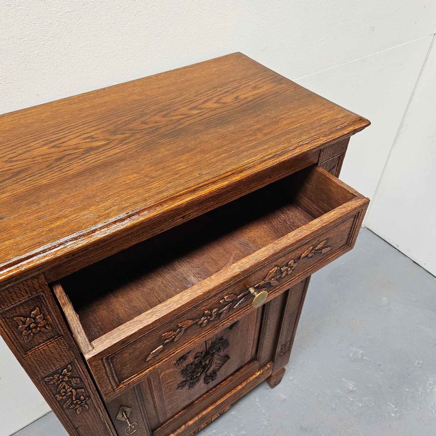 Lovely French oak 19th Century Henry 2nd style side cabinet with one drawer and one cupboard. It is in good original condition.