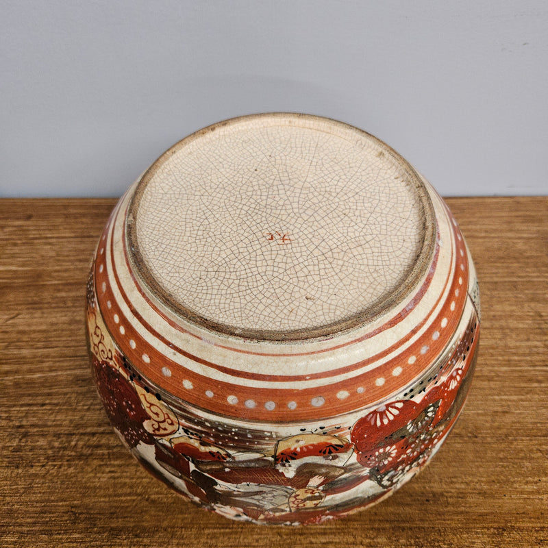 Antique Satsuma hand painted jardinière pot. It is signed and has some crazing. In good condition.