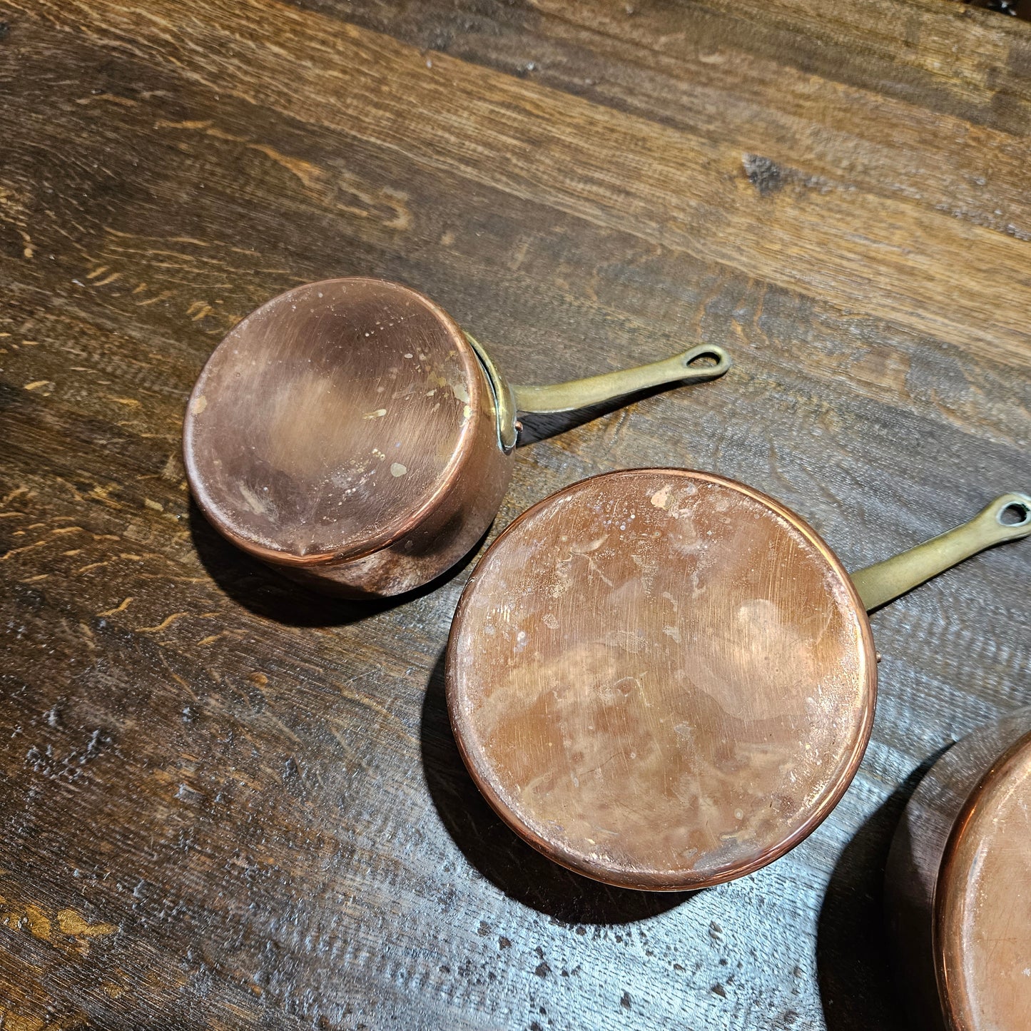 Lovely set of five copper sauce pots, they are all in good original condition for the age. Sourced from France.