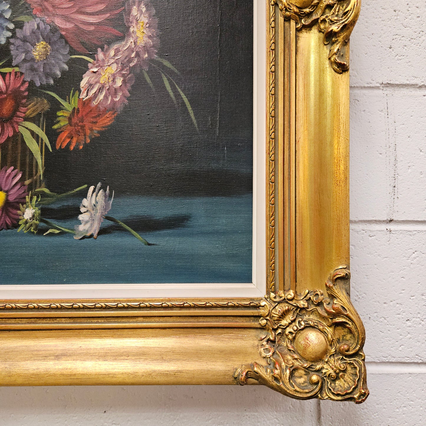 Sourced from France a vibrant signed oil on canvas floral still life in a stunning gilt frame. In good original detailed condition. Please see photos as they form part of the description and condition.