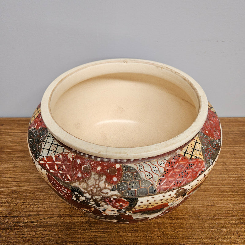 Antique Satsuma hand painted jardinière pot. It is signed and has some crazing. In good condition.