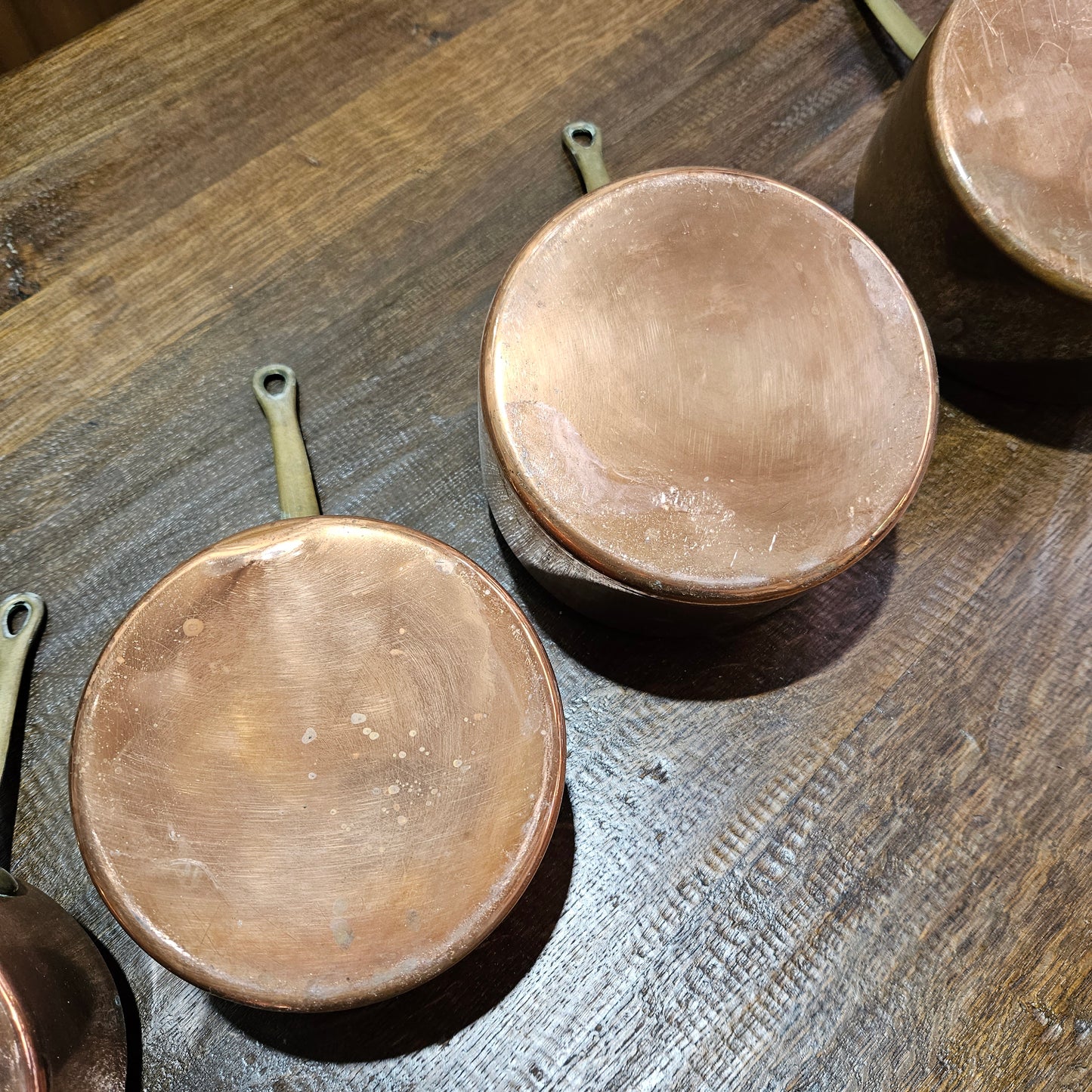 Lovely set of five copper sauce pots, they are all in good original condition for the age. Sourced from France.