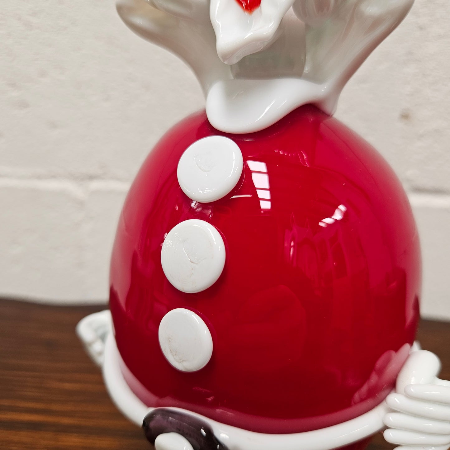 Very rare Murano Glass Christmas clown By Fratelli Pitau. It still has its original sticker and tag. It is in good original condition with no chips or cracks.