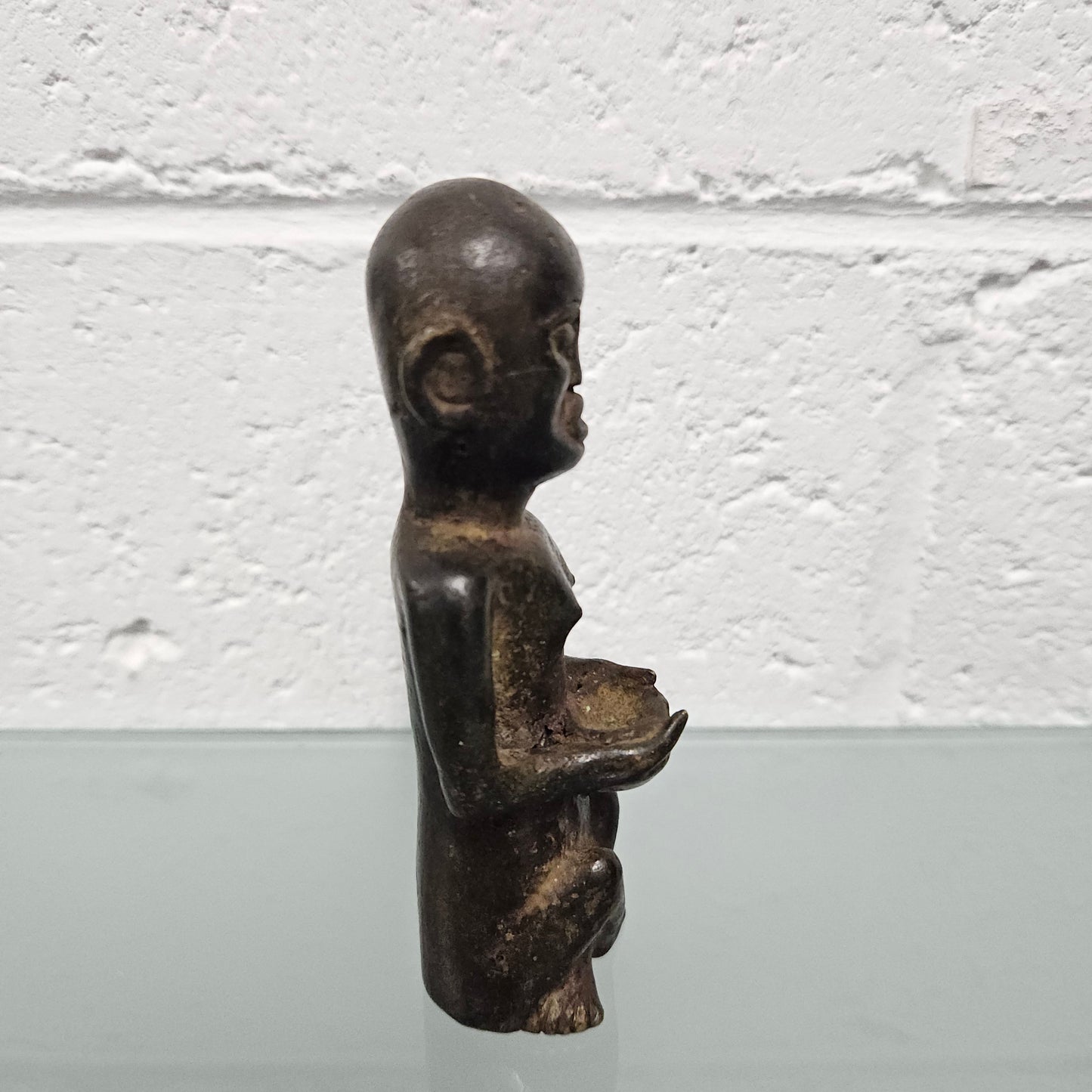Unusual antique African bronze native figure. In good original condition.
