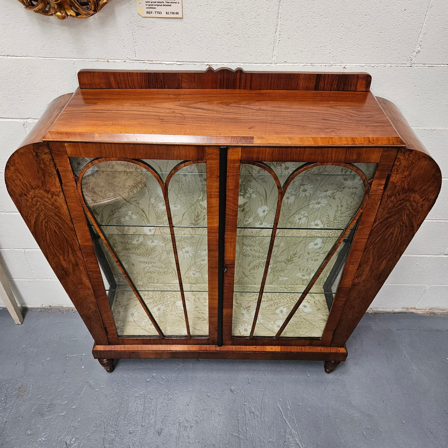 Stunning Art Deco display cabinet with two glass shelfs, Walnut and lockable glass doors. This cabinet is in great original condition for the age.