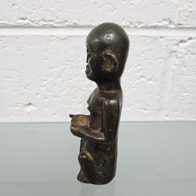 Unusual antique African bronze native figure. In good original condition.
