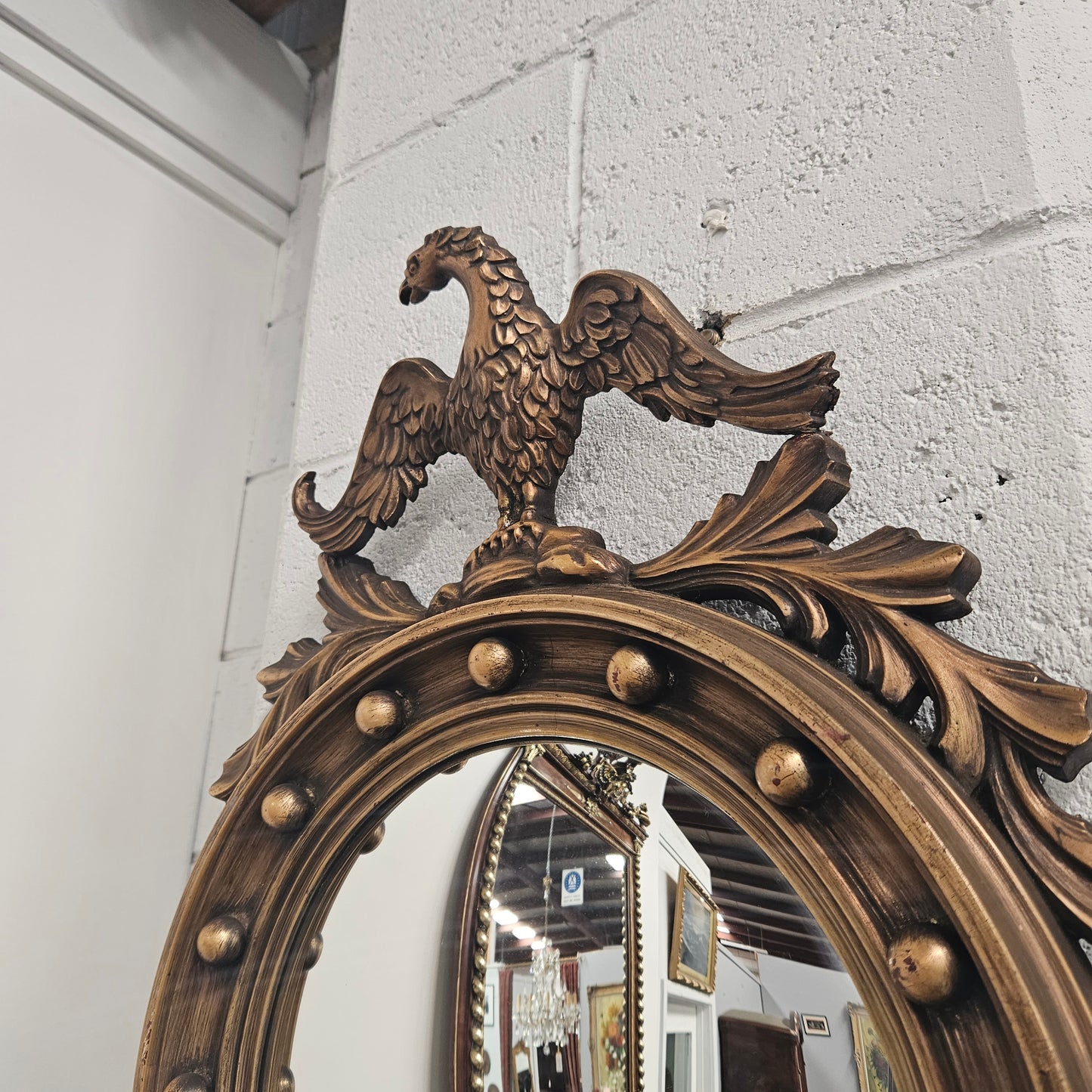 Vintage French Empire Style Gilt Convex Mirror Featuring Eagle