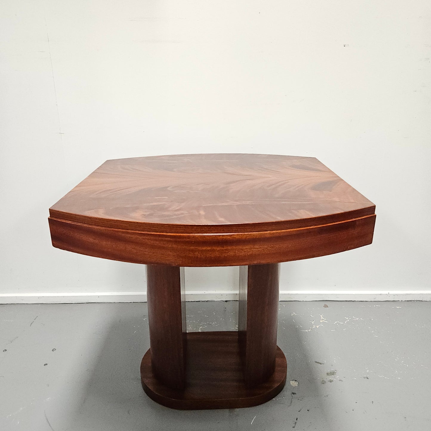 French Art Deco flame mahogany center table. Sourced directly from France it is in good original detailed condition. Circa 1930's