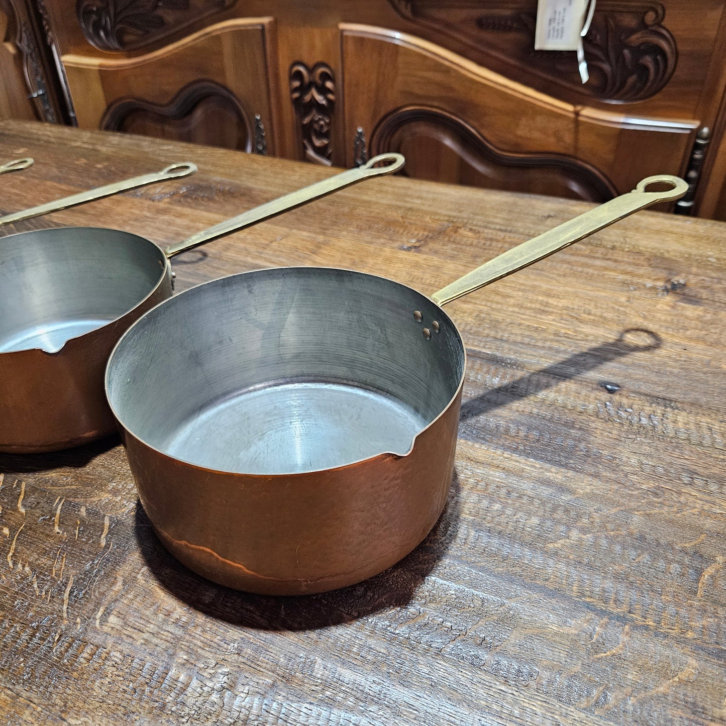 Amazing set of five sauce pots with spouts, lovely handles. They are in good original condition and have been sourced from France