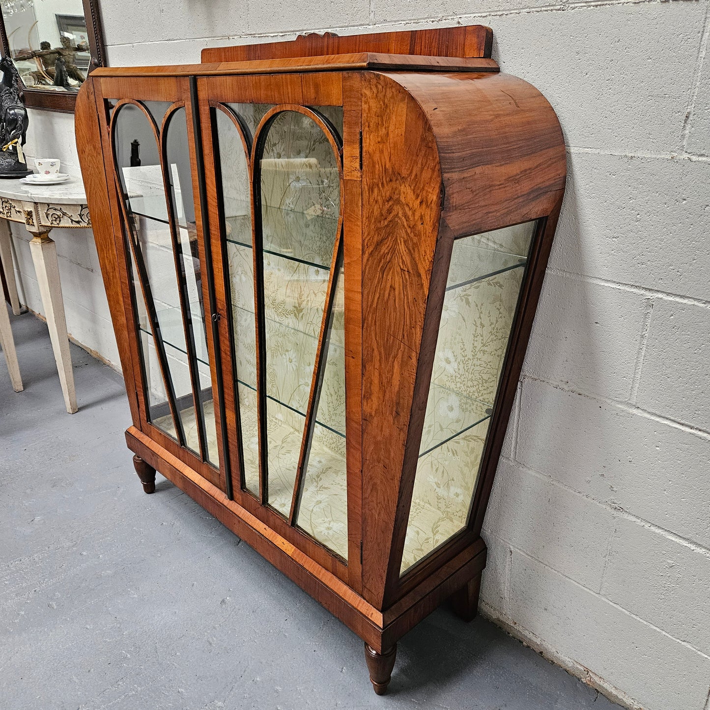 Stunning Art Deco display cabinet with two glass shelfs, Walnut and lockable glass doors. This cabinet is in great original condition for the age.