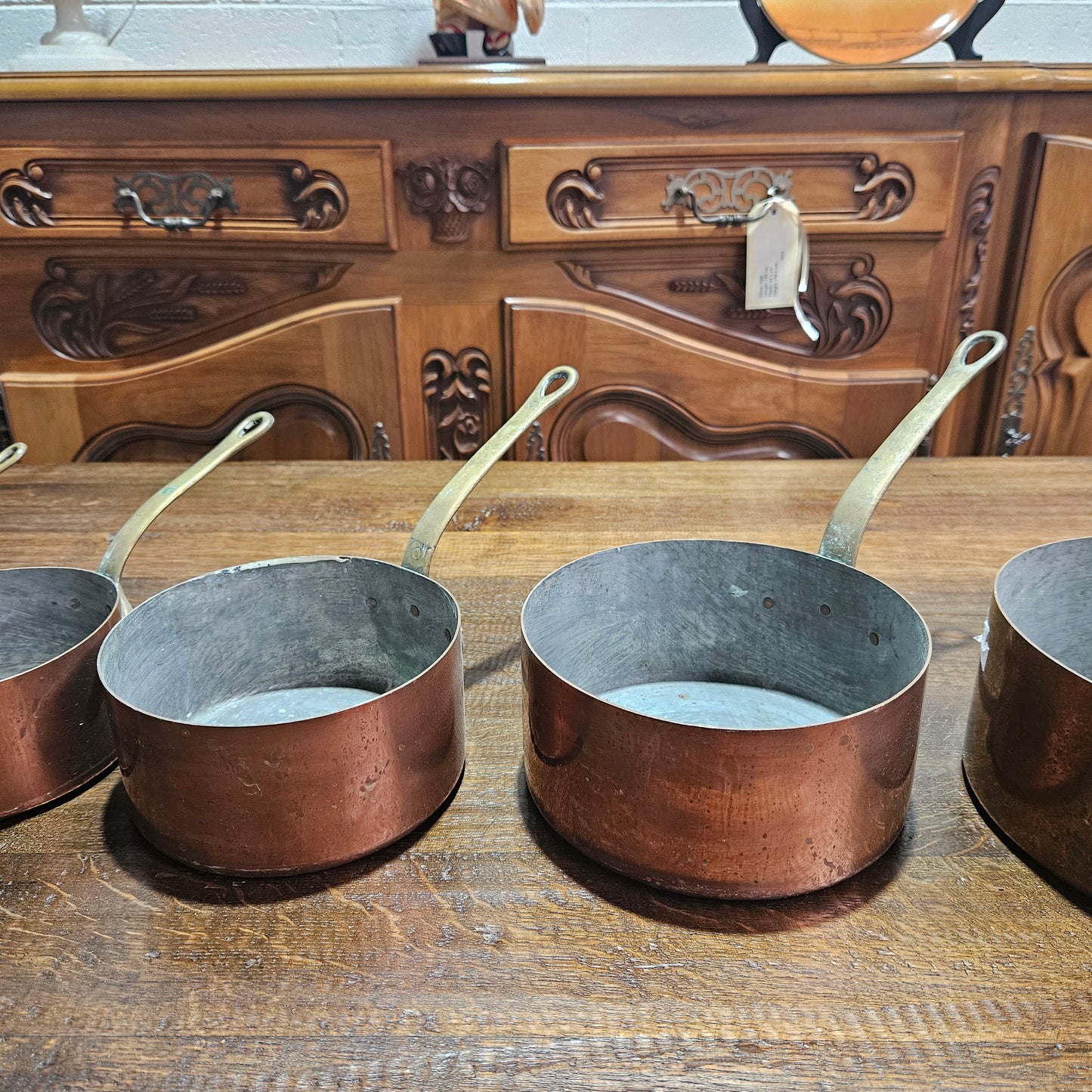 Lovely set of five copper sauce pots, they are all in good original condition for the age. Sourced from France.