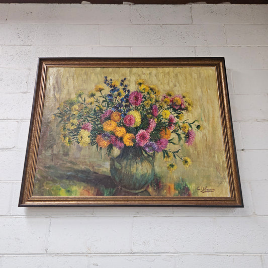 Sourced from France a large signed oil on canvas still life in a simple but elegant gilt frame. It is in good original condition. Please see photos as they form part of the description and condition.