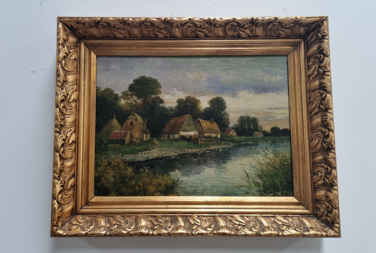 Lovely framed original oil on canvas of a country cottage scene on a river in good original condition
