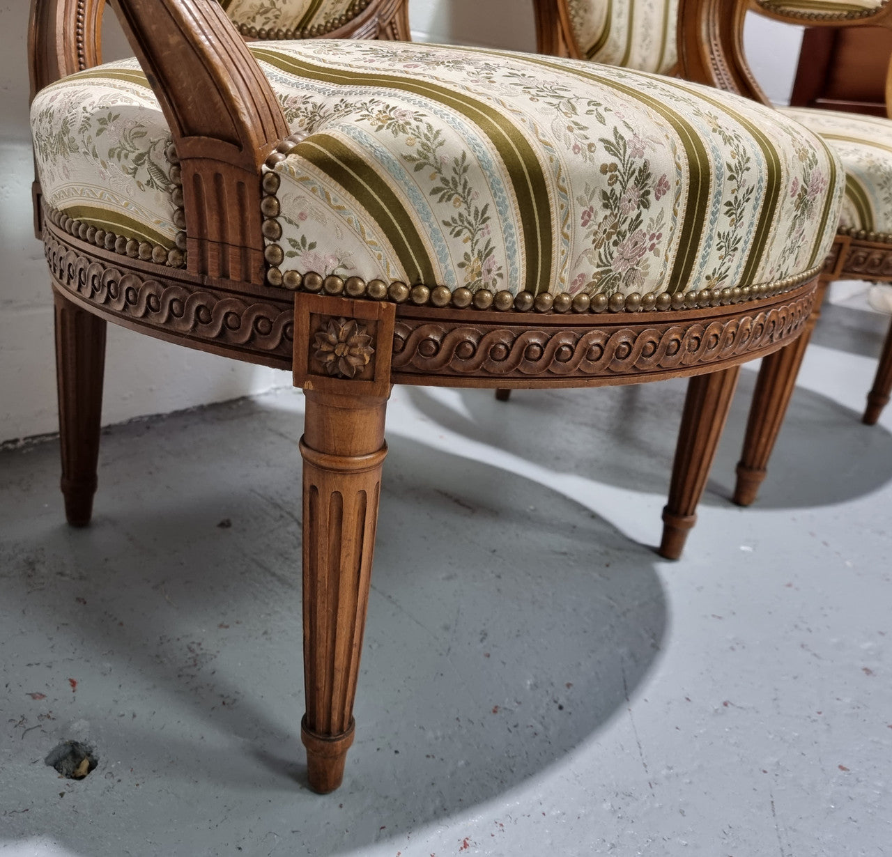 Pair of French Louis XV matching carved armchairs. They are in good overall condition with some slight wear to fabric, please view photos as they help form part of the description.