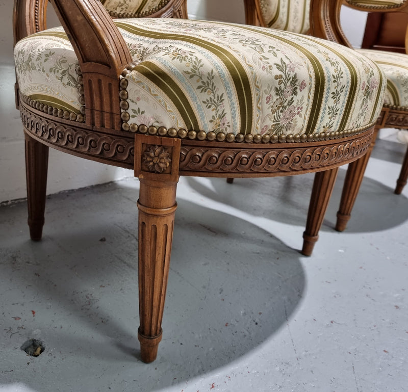 Pair of French Louis XV matching carved armchairs. They are in good overall condition with some slight wear to fabric, please view photos as they help form part of the description.