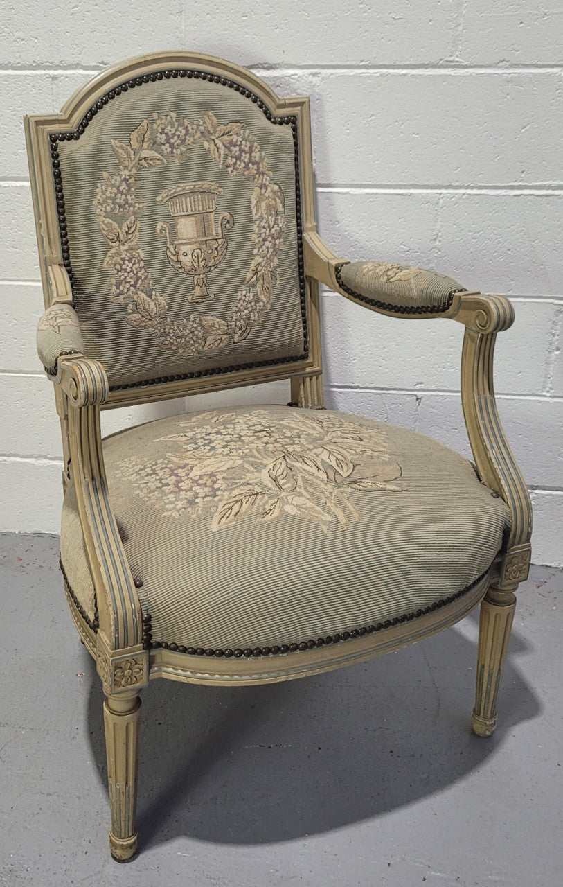 Lovely Louis XVI style painted fauteuil with lovely sage coloured tapestry upholstery. In good original condition.