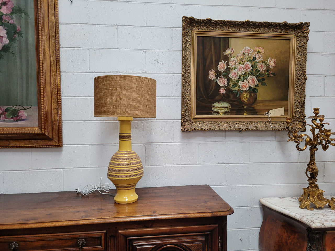 A large and impressive Vintage Mid-Century Bitossi Italian terra cotta lamp base and shade. Incised repeating geometric terra cotta pattern creates a tactile element which is incorporated with stunning shining thick yellow glaze to create the sculptural form of the base.