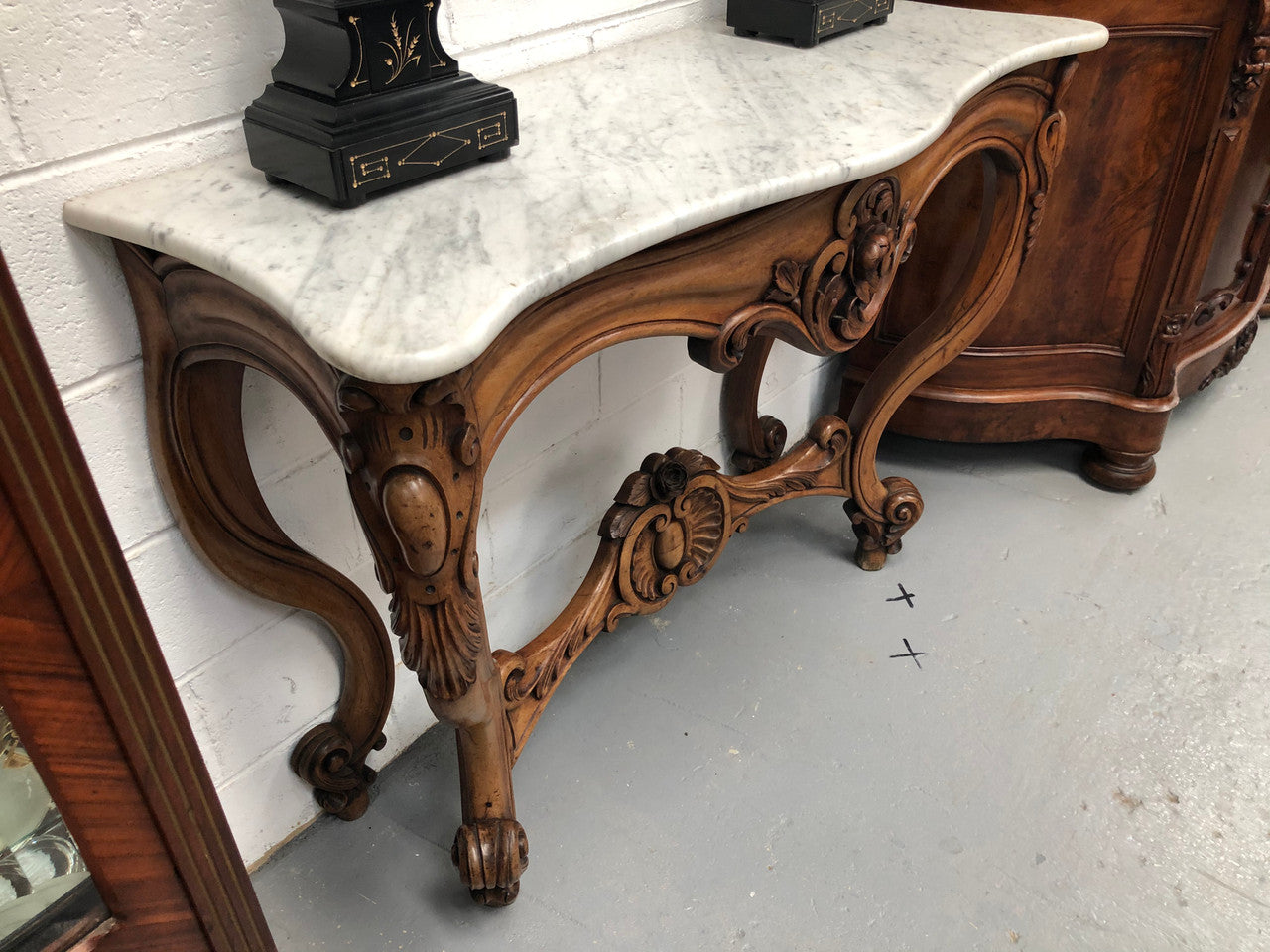 19th Century Louis XV style beautifully carved console table. With detailed ornate carving and a beautiful marble top. In good original detailed condition.