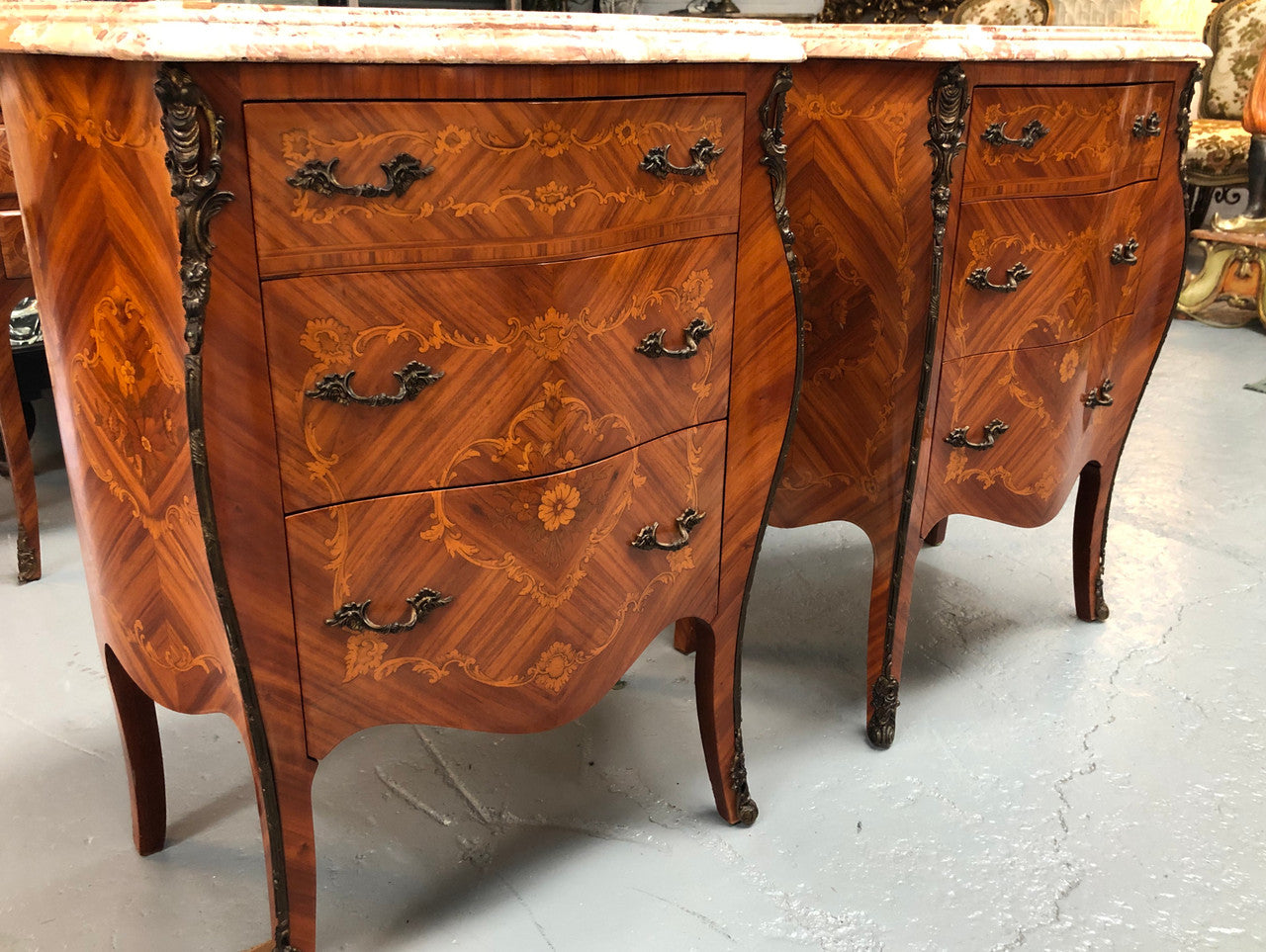 Rare Pair of French miniature commode bedsides with beautiful marquetry inlay & ormolu mount. Circa 1950's and are in very good condition.