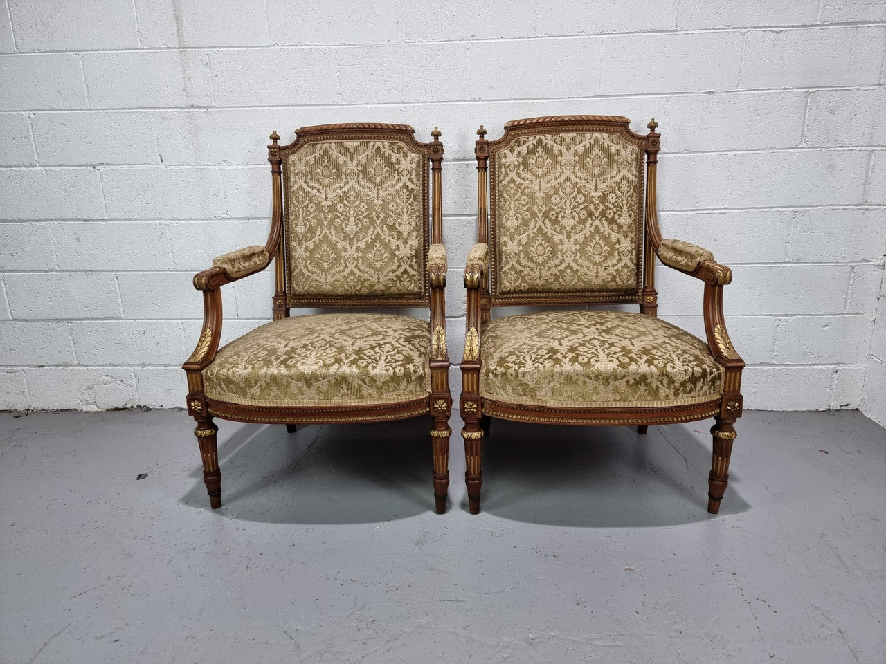 Beautiful French walnut Louis XVI style upholstered three piece Salon Suite. It has lovely fabric which is in overall good condition and is very comfortable to sit in. In good original detailed condition.