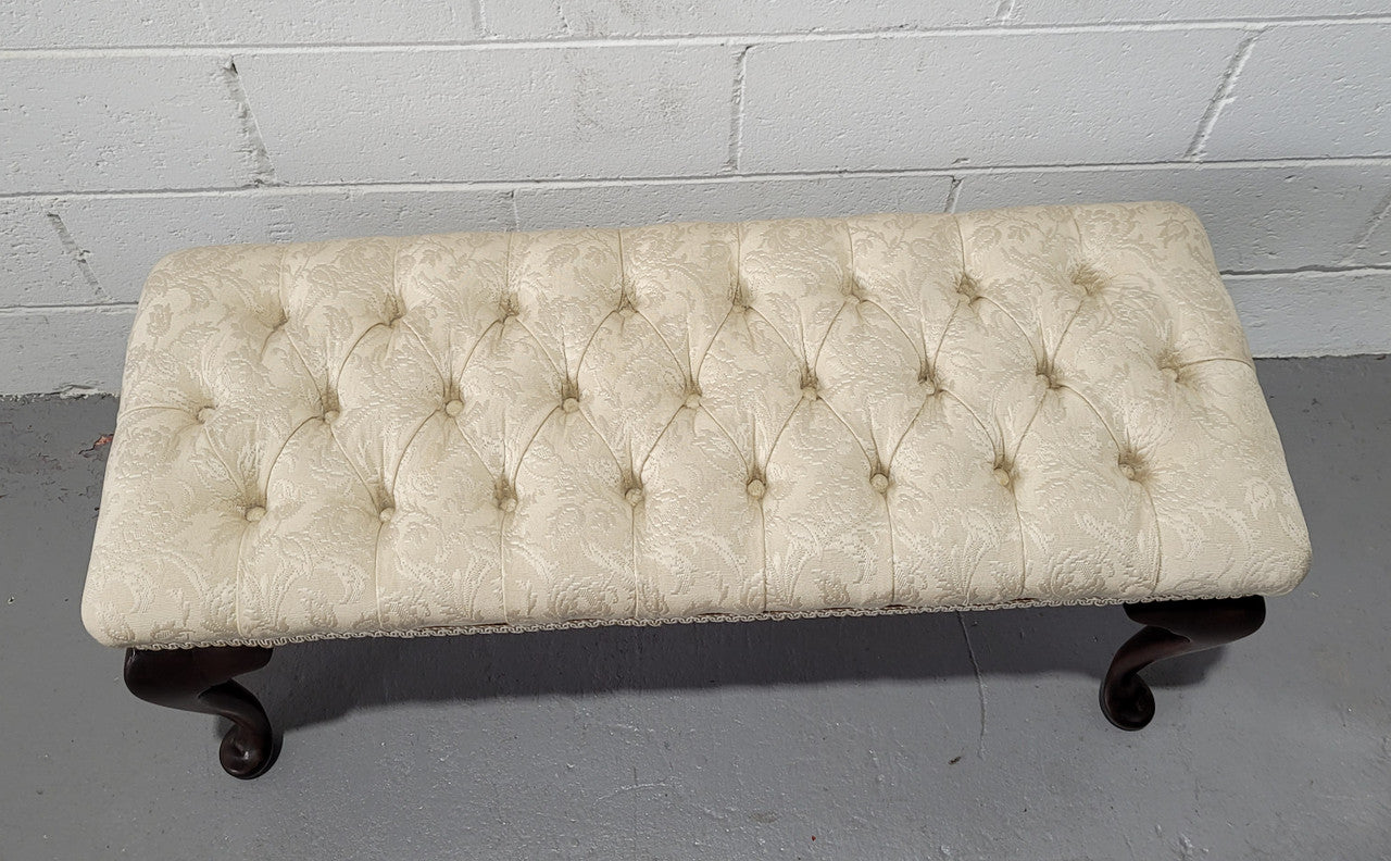 Vintage neutral upholstered buttoned stool. Fabric is in good used condition, please view photo's has they help form the description. The stool its self is in good condition.