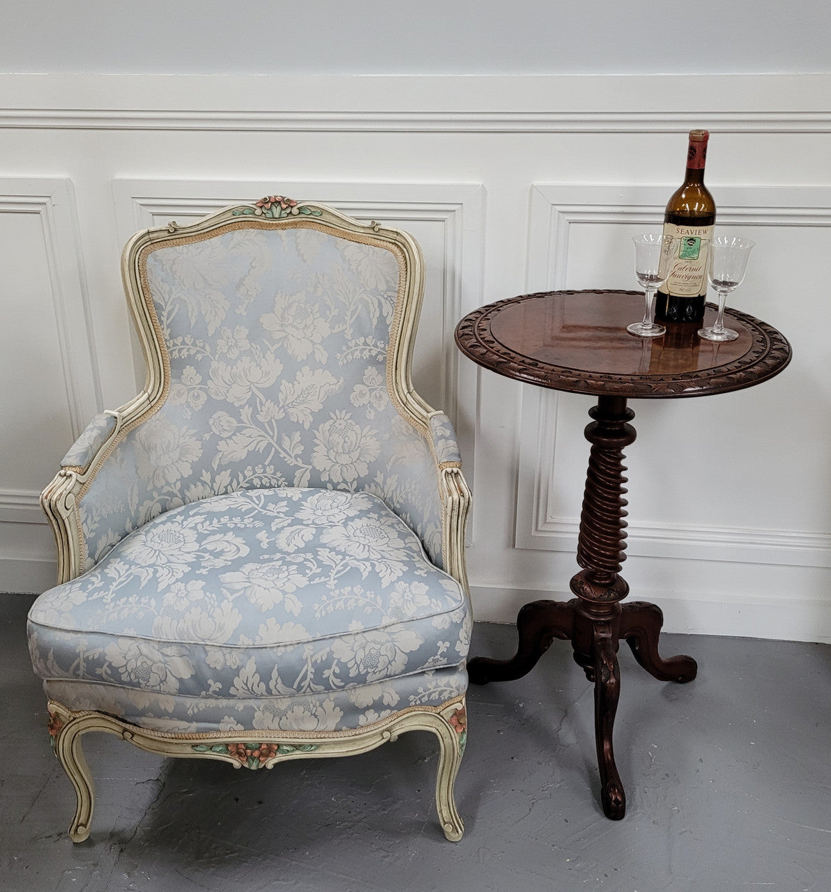 Rare early Victorian Irish Burr Walnut wine table. It has a beautiful carvings and a stunning burr walnut top, on a barley twist column and three shaped legs. It has been sourced locally and is in good original detailed condition. We also have a second table being sold separately which when together make a matched pair.