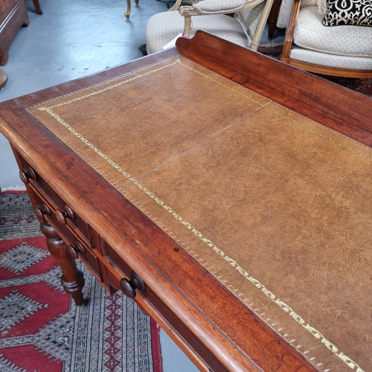 Lovely Victorian Cedar leather tooled top desk, with five drawers on castors and of pleasing proportions. In very good original detailed condition and has been sourced locally.