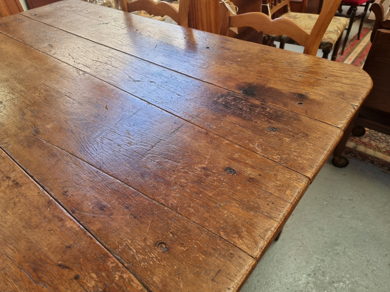 Fabulous early 19th Century Antique Fruitwood Farmhouse table of small proportions and loads of rustic detail. In good original detailed condition.