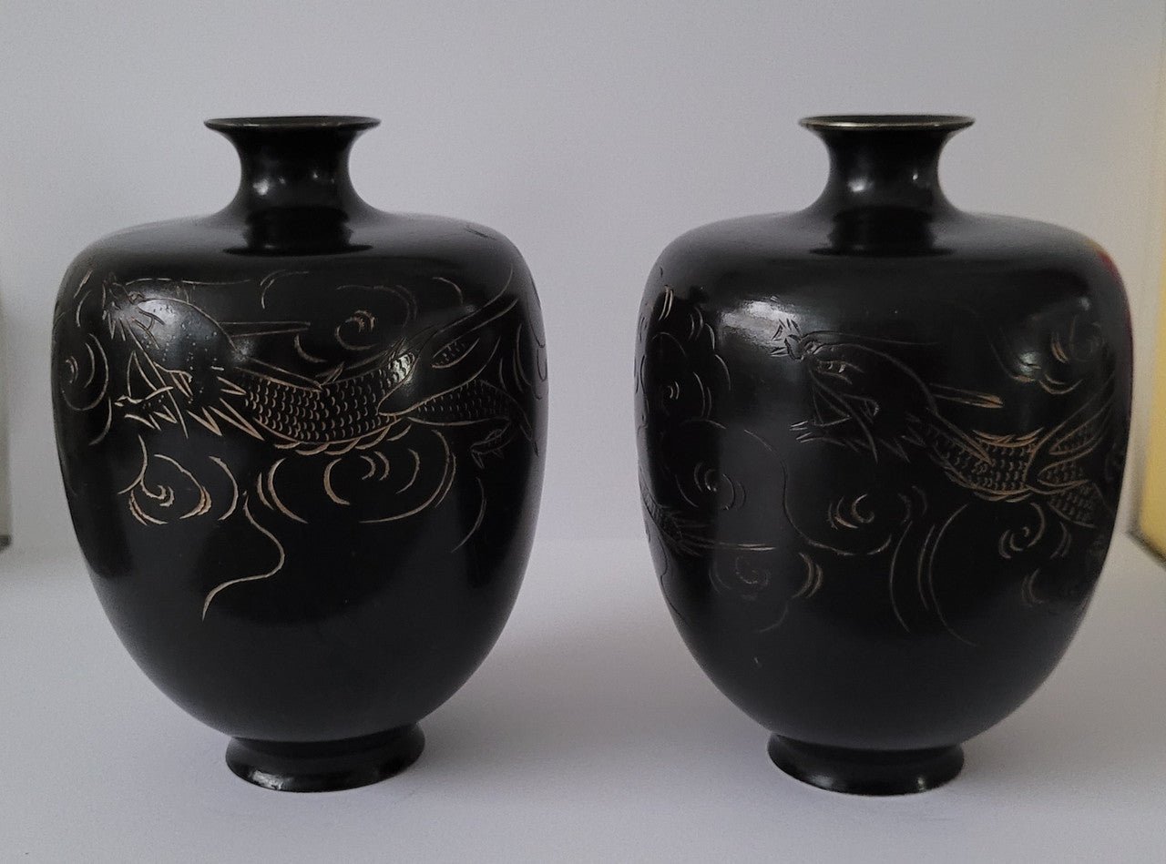 Pair of Antique Meiji Period Japanese etched Bronze vases. It is in good original condition, please view photos as they help form part of the description.