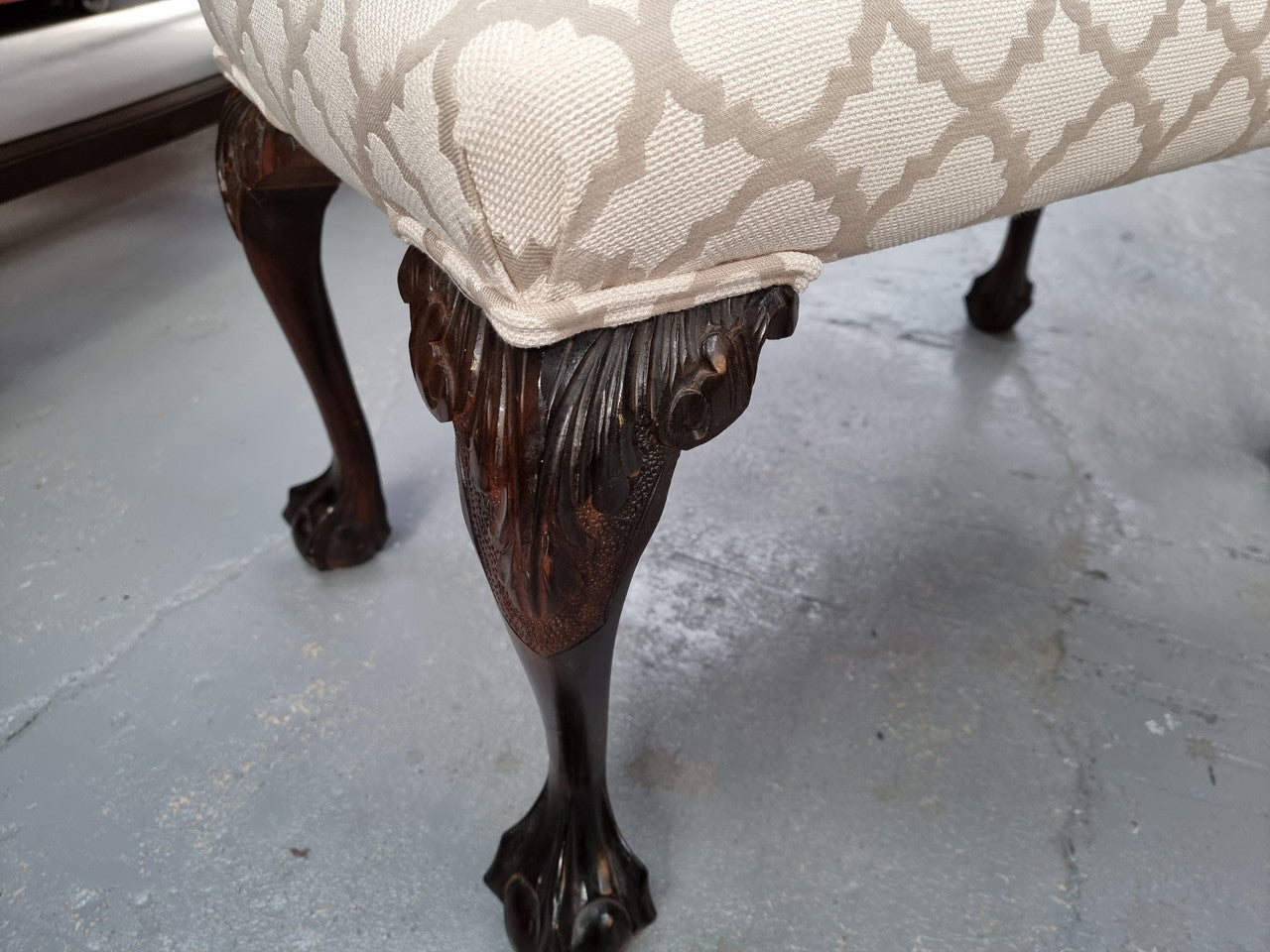 Upholstered Chippendale stool. Fabric is in very good condition and chair is in good original detailed condition.