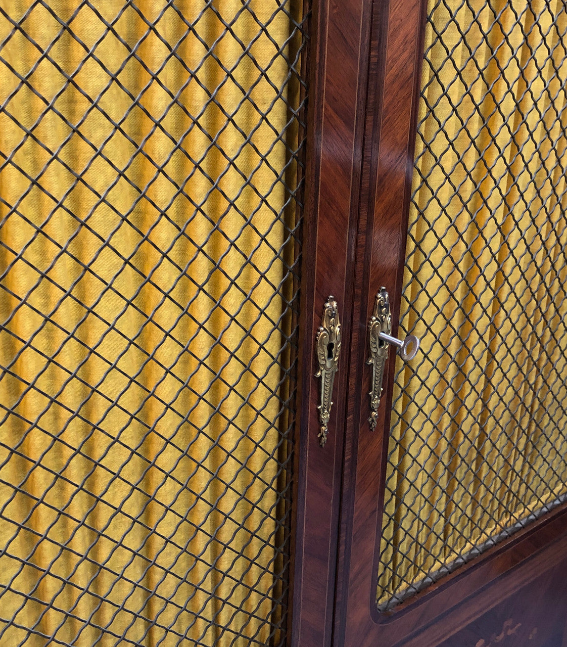 Beautiful 19th Century French Louis XV style Mahogany Blind Bookcase. This piece has lovely inlaid doors and ormolu mounts, marble top and four adjustable shelves. In good original detailed condition.