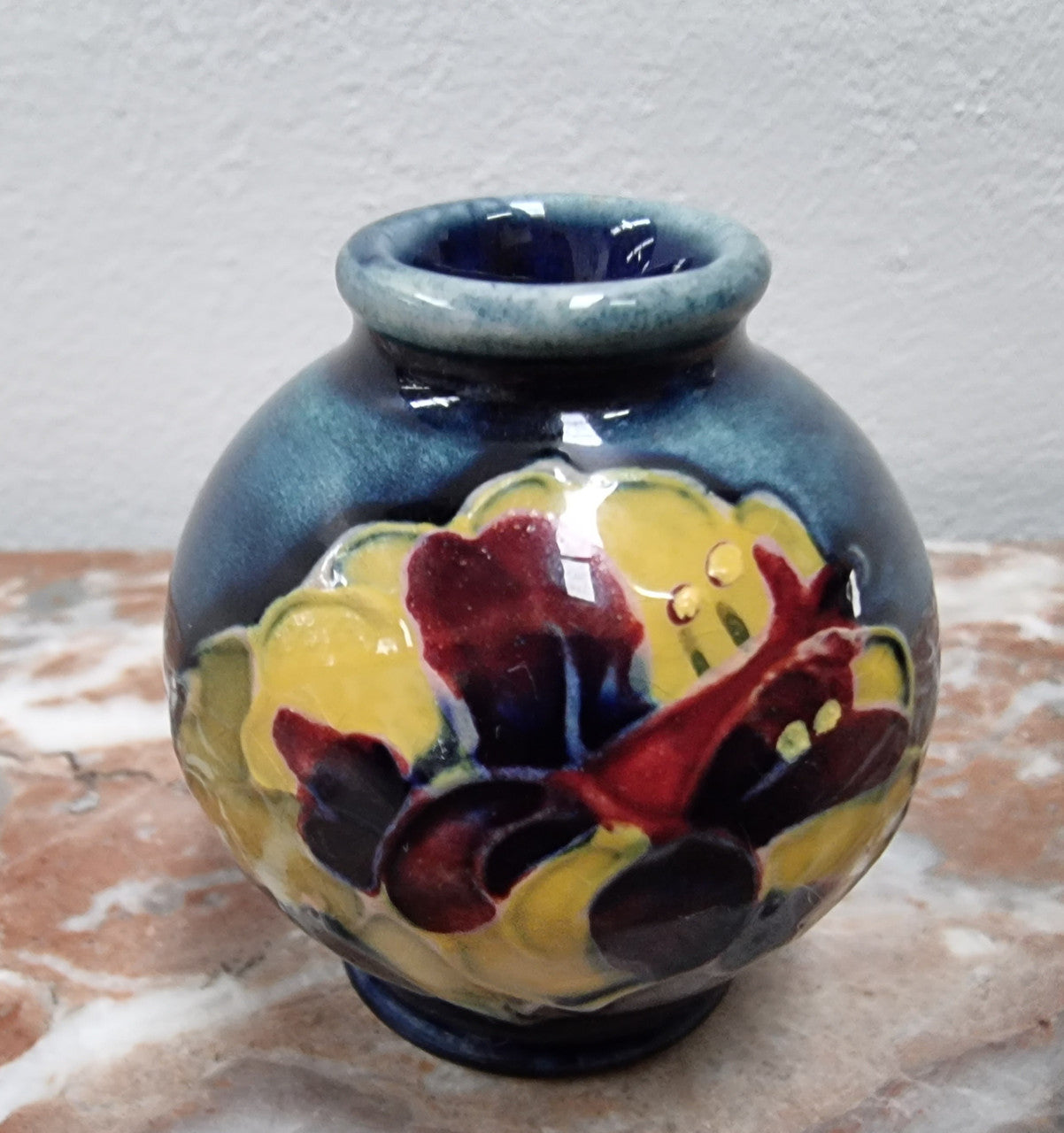 Rare Miniature Moorcroft vase with very vibrant and is in good original condition