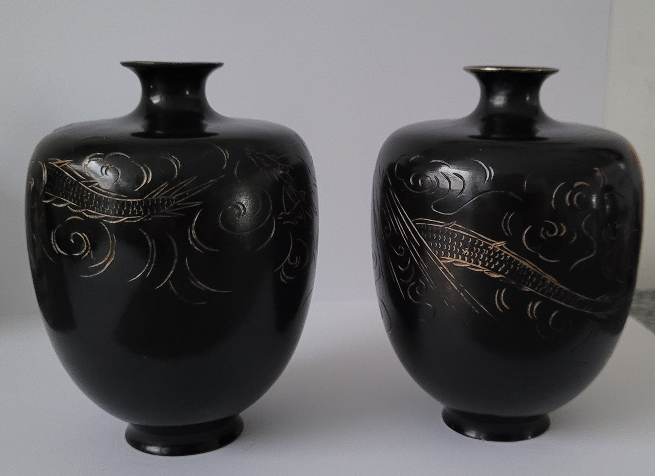 Pair of Antique Meiji Period Japanese etched Bronze vases. It is in good original condition, please view photos as they help form part of the description.