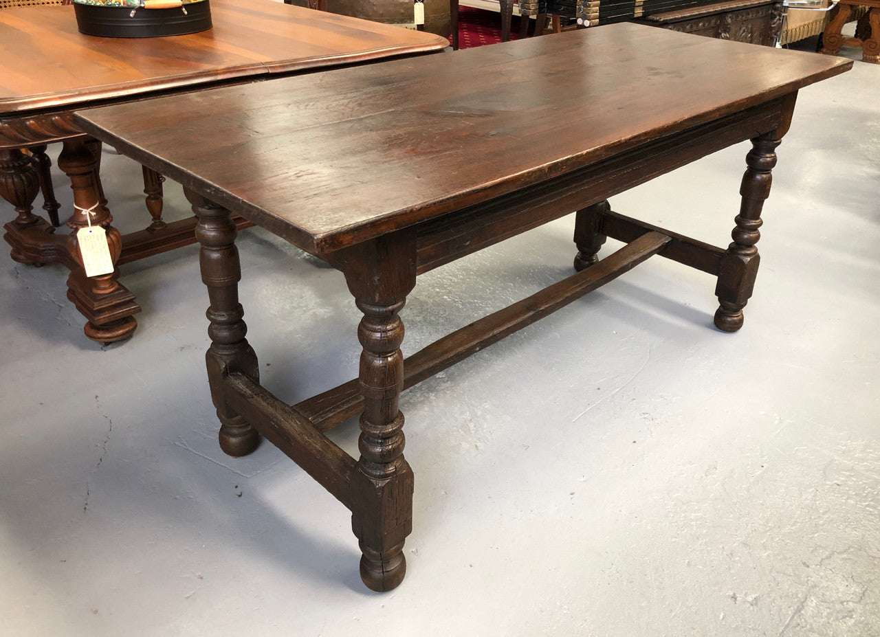 Early 19th Century French Oak petite size dining table. It seats six comfortably and would be ideal for an area with limited space. In very good original detailed condition.