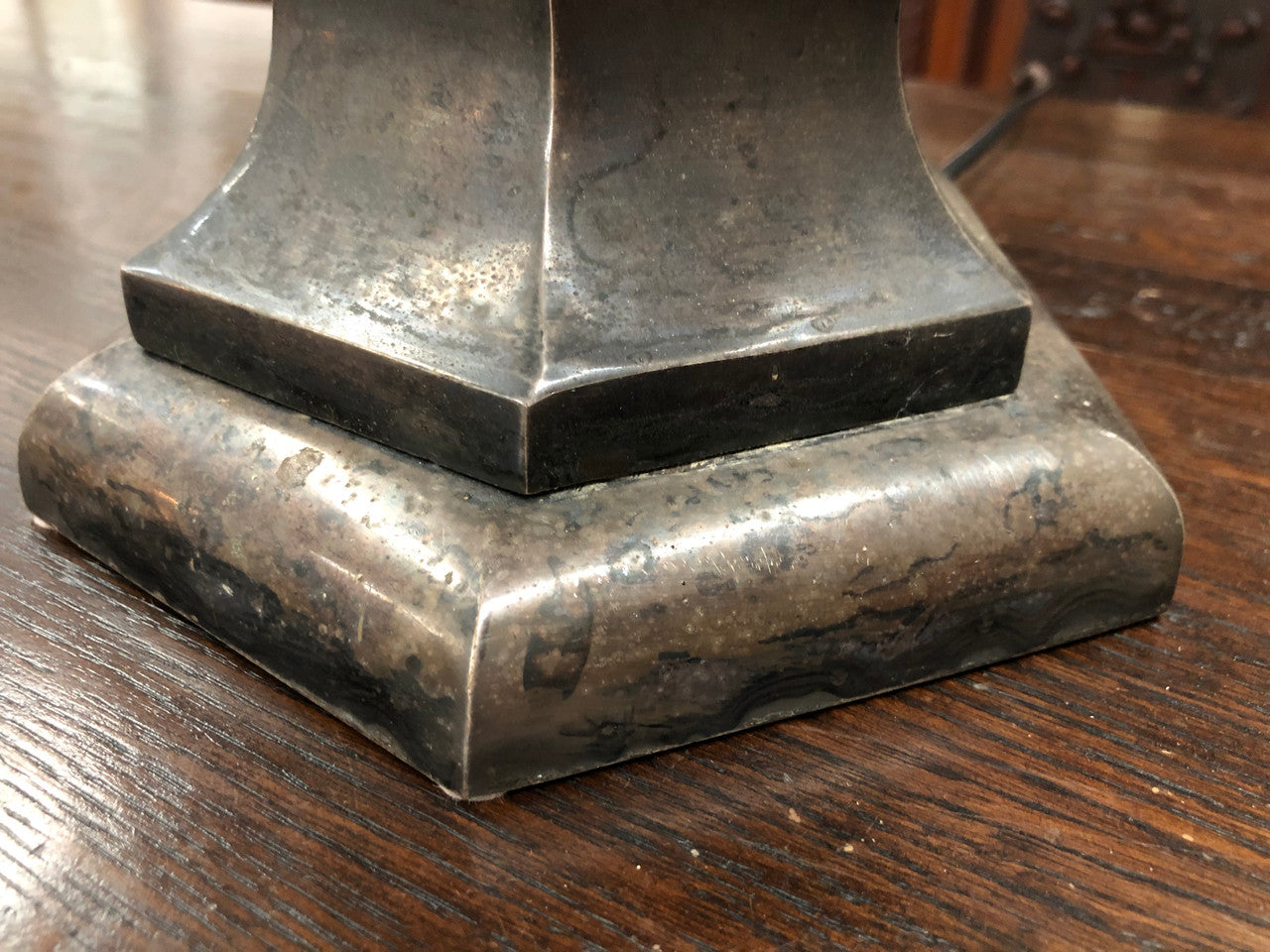 Beautiful pair of 19th Century pewter covered Bronze table lamps with light grey shades .They have been rewired and in good working order.
