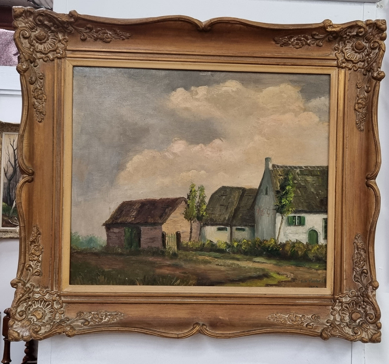 French signed oil on canvas depicting farmhouse in a lovely gilt frame. It is in good original detailed condition and has been sourced from France.