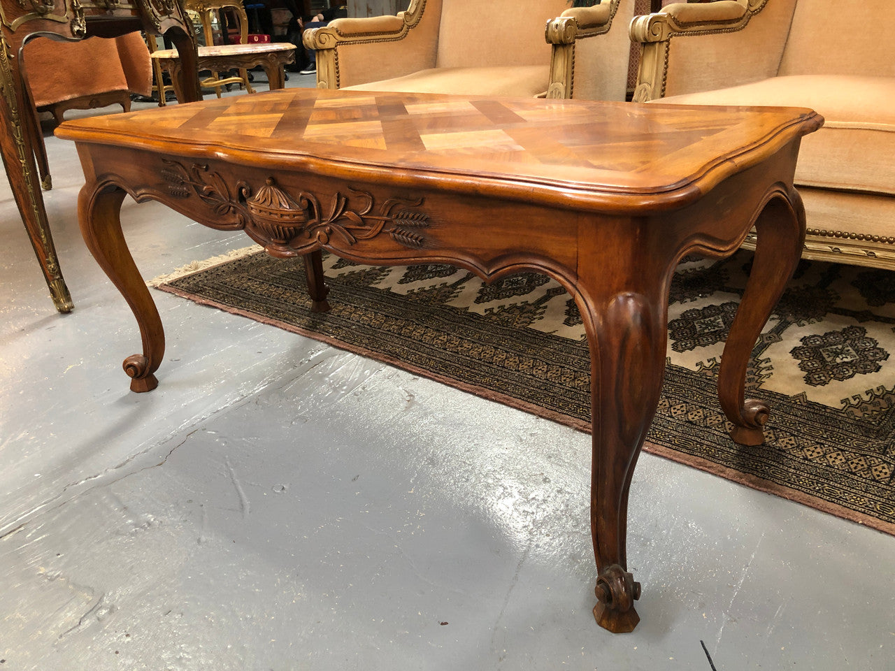 French Walnut parquetry top coffee table. In good original detailed condition. Circa: 1950's