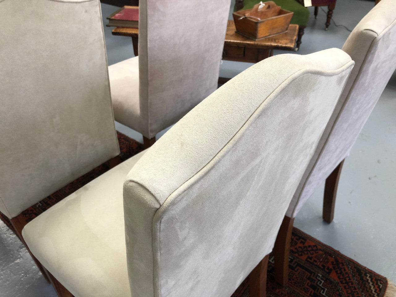 Beautiful set of four upholstered taupe/ light fawn dining chairs which are very comfortable to sit in. They are in good original condition.