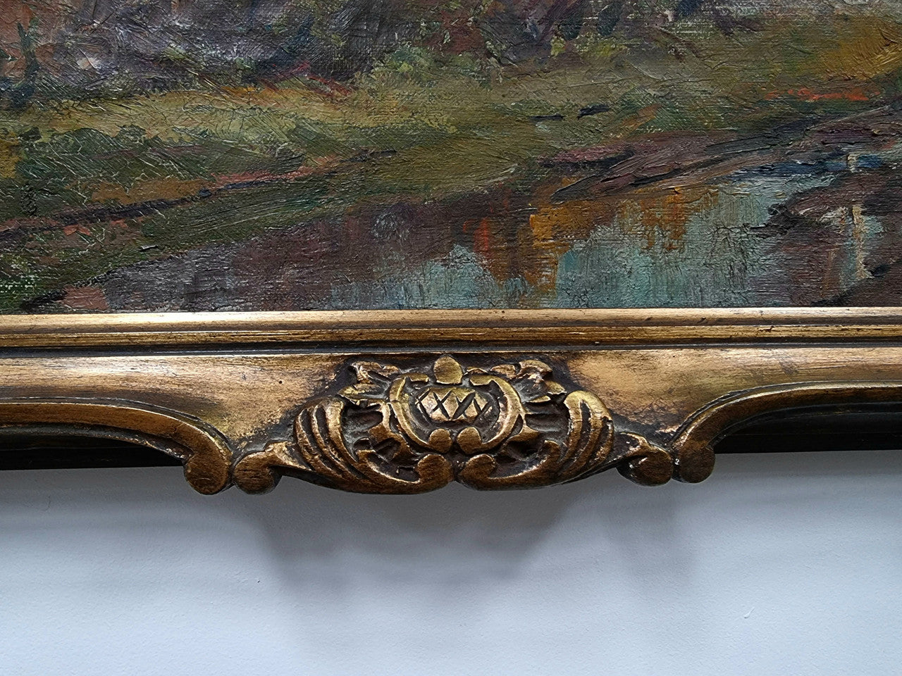 French signed country scene oil on canvas in a lovely decorative frame. In good original condition.