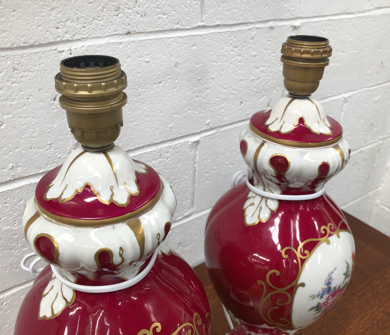 Pair of highly decorative Paris Porcelain table lamps. They are wired to Australian standards and are in very good original condition. Circa 1950's.