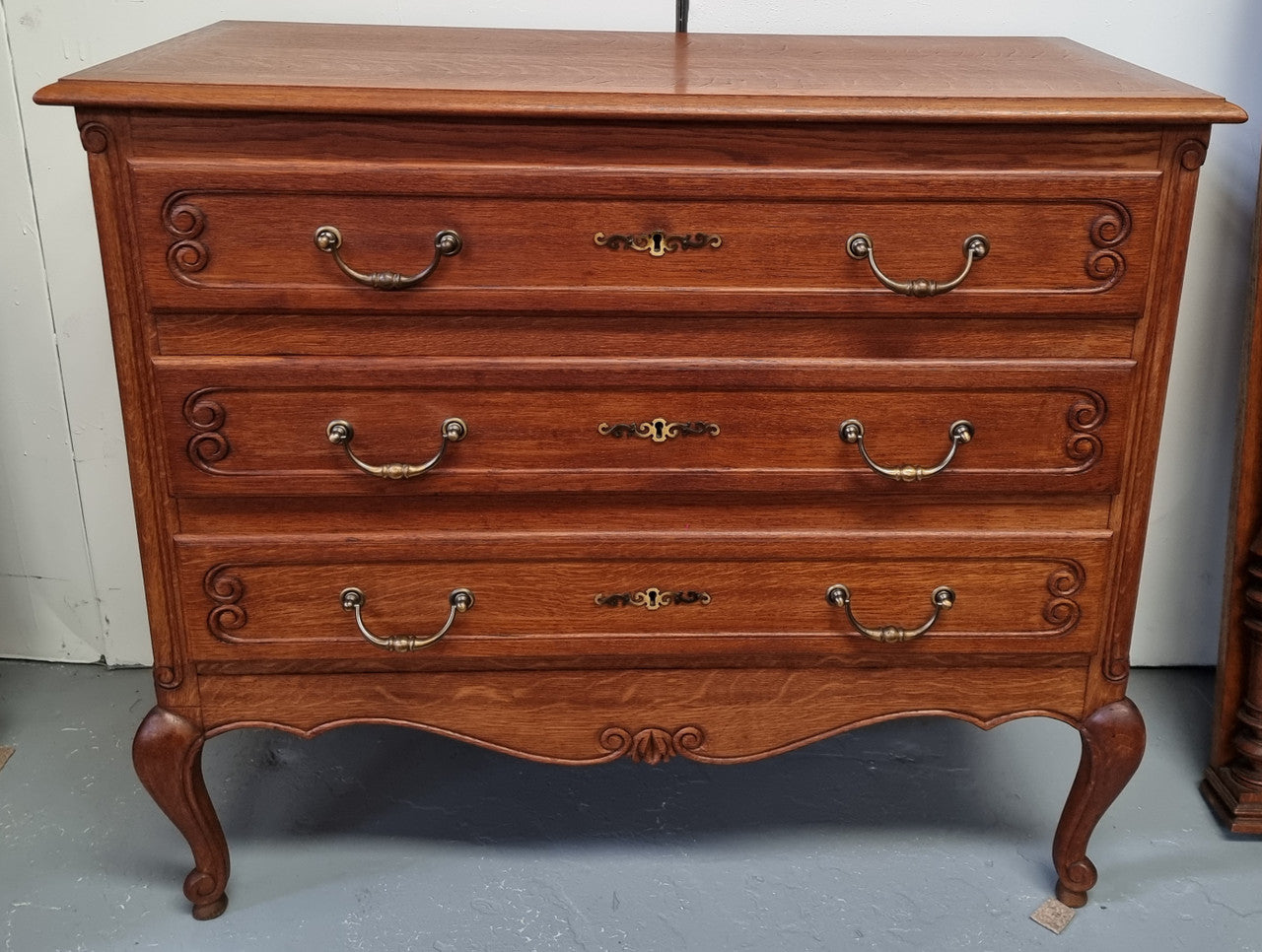 French Provincial Oak chest of three drawers. In good original detailed condition.